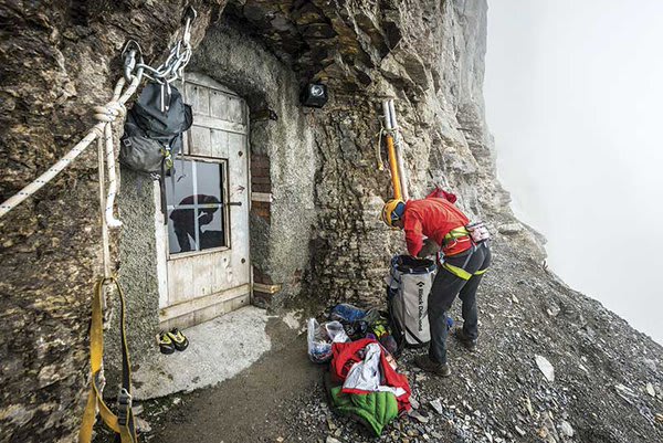 Image of a doorway leading from the train tunnel out to the face of the Eigerwand