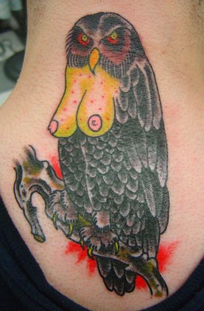 Terrible-tattoo-awards-2013-owl-with-boobs
