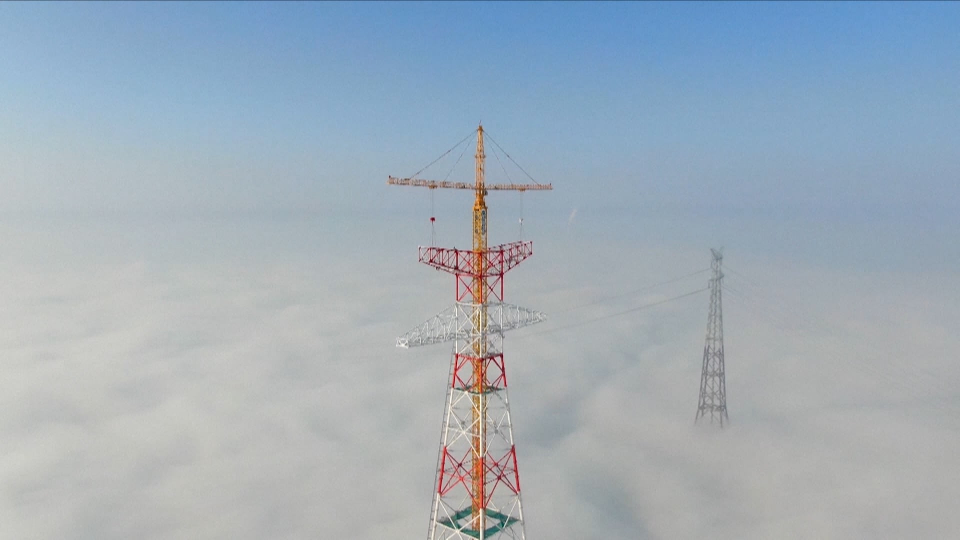 World's tallest transmission tower capped in E China's Jiangsu - CGTN